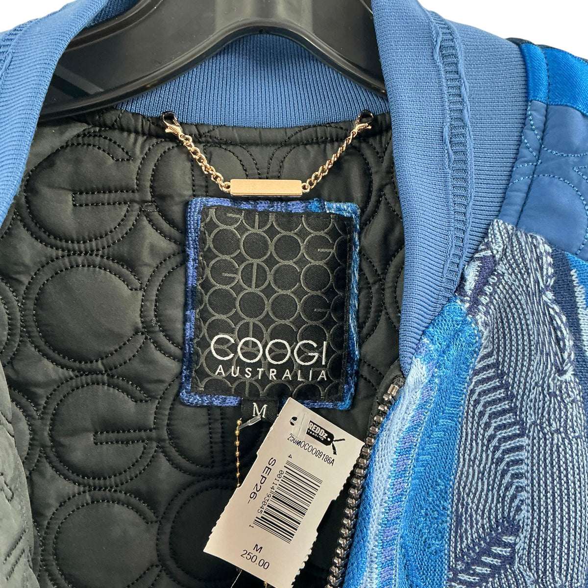 COOGI Australia Sweater Patched Bomber Jacket