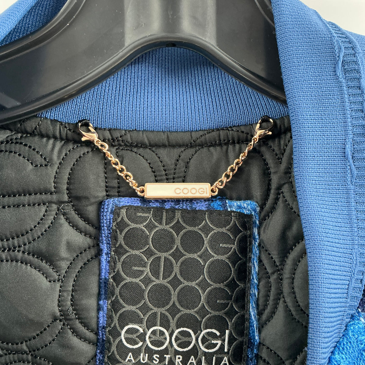 COOGI Australia Sweater Patched Bomber Jacket