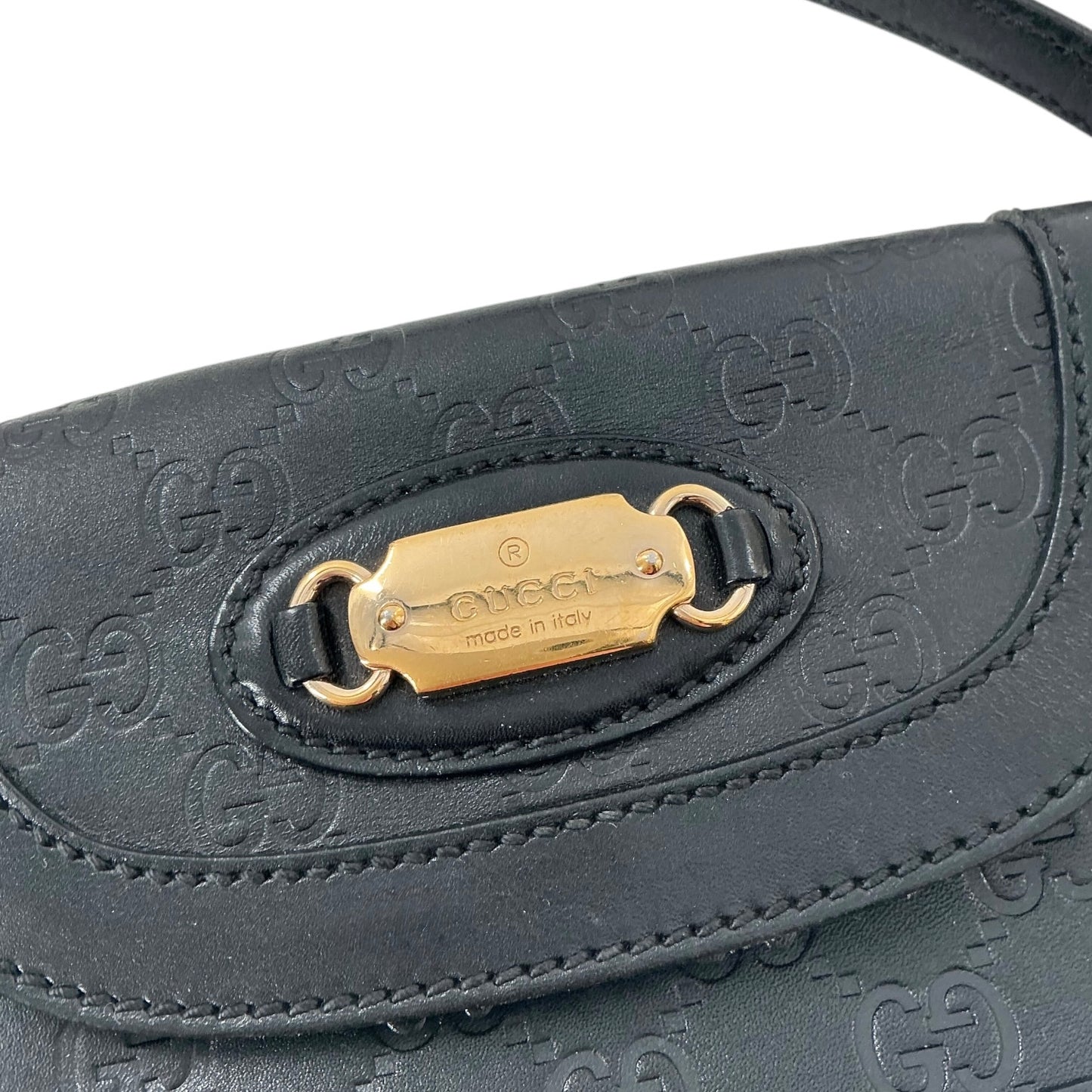 Gucci Leather Handbag with Embossed GG Monogram Pattern