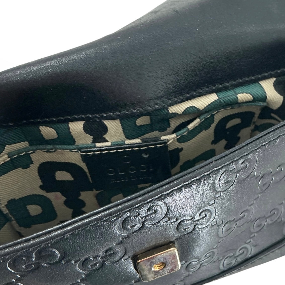 Gucci Leather Handbag with Embossed GG Monogram Pattern